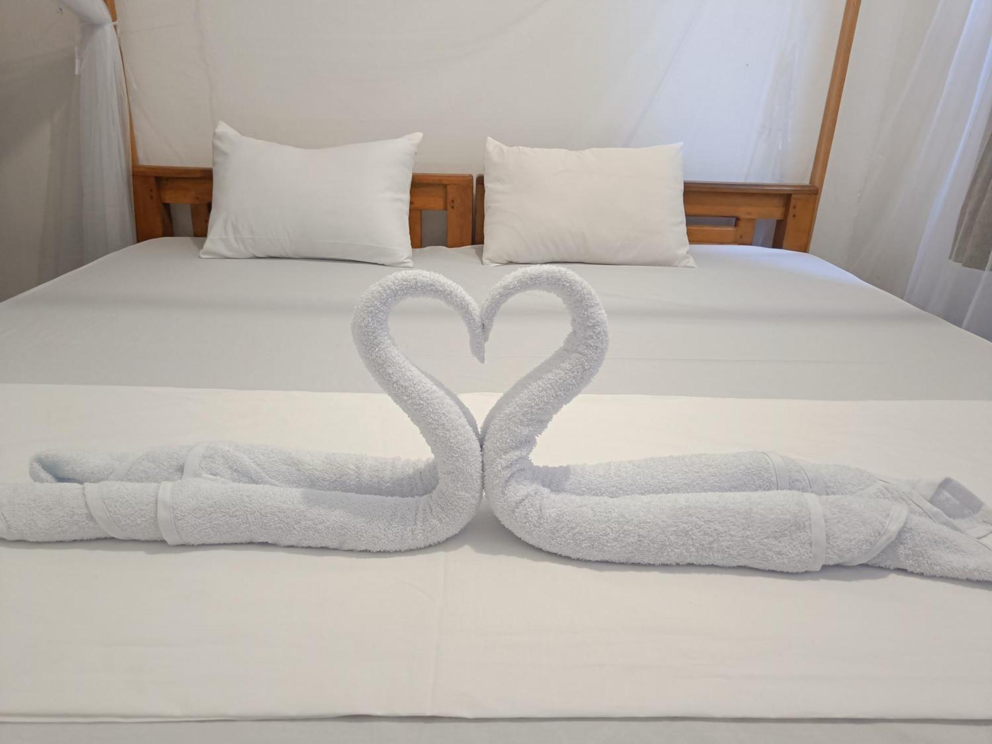 Kingly Aroma Hotel อารูกัมเบย์ ห้อง รูปภาพ