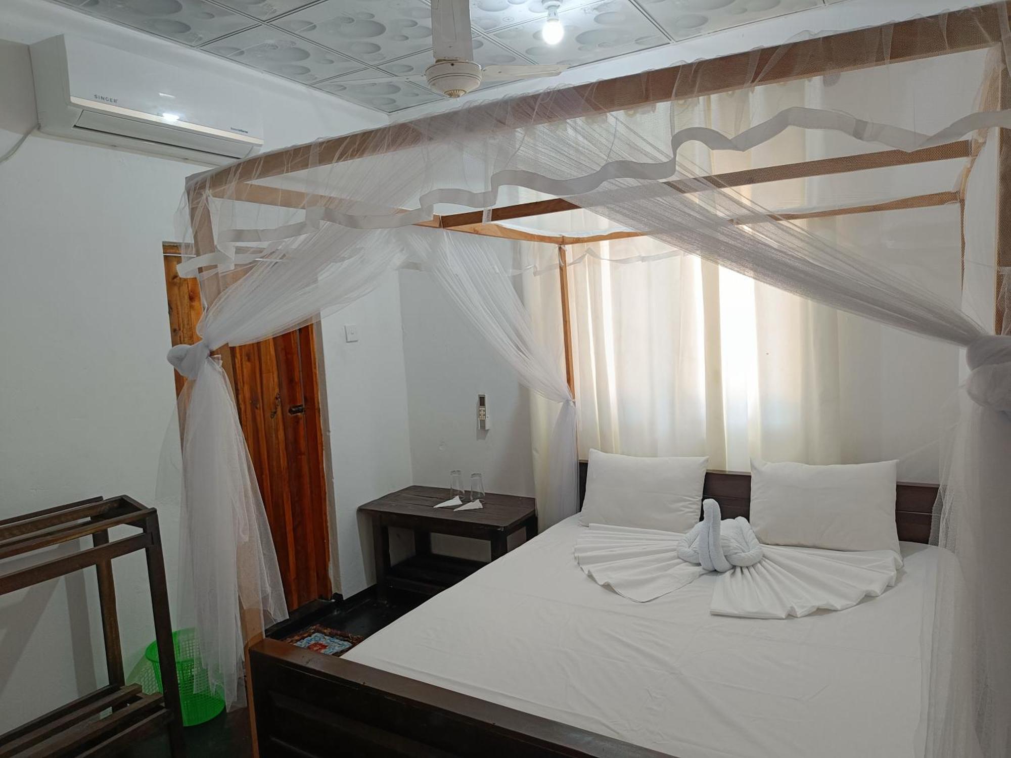 Kingly Aroma Hotel อารูกัมเบย์ ห้อง รูปภาพ