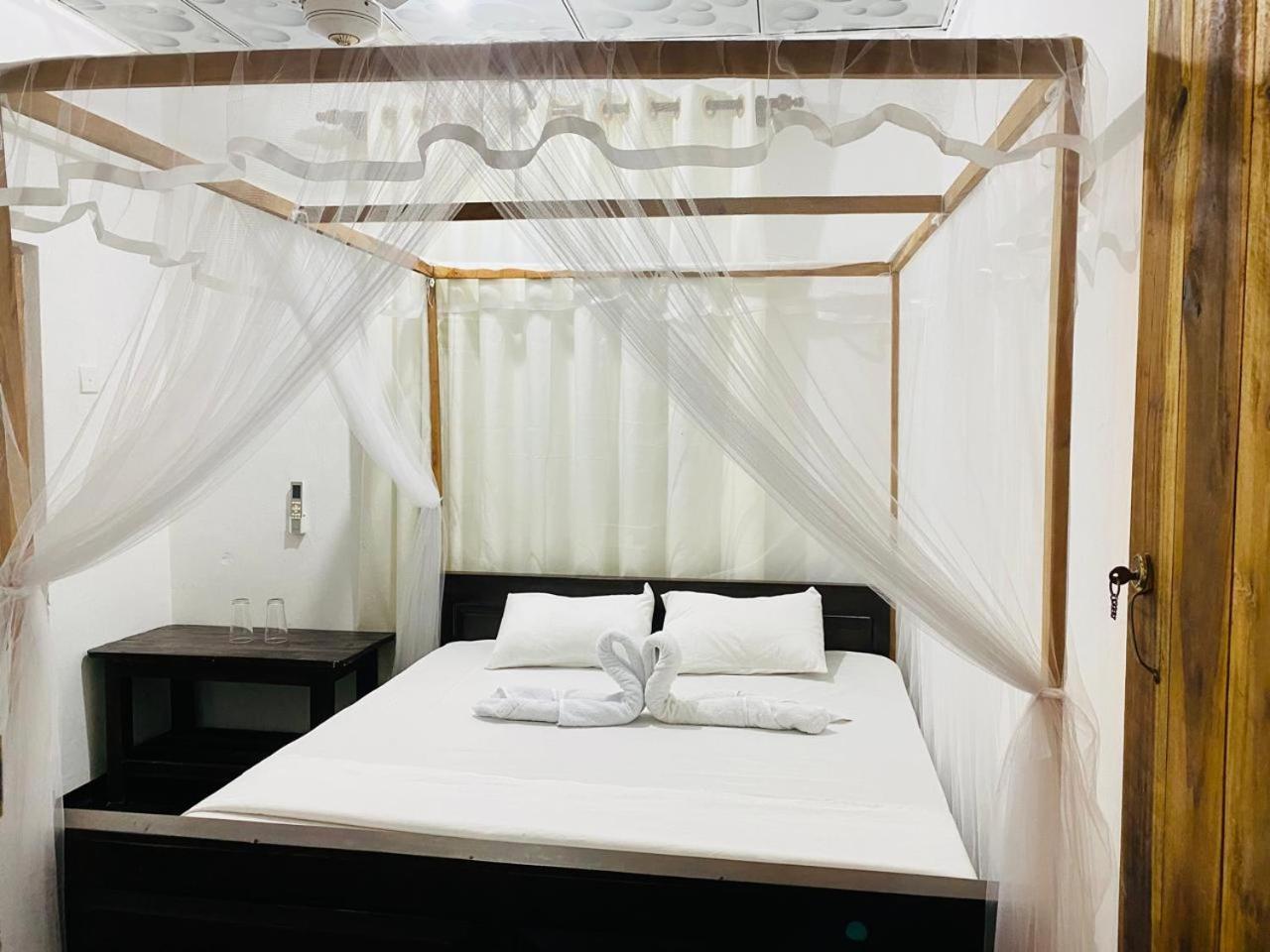 Kingly Aroma Hotel อารูกัมเบย์ ห้อง รูปภาพ